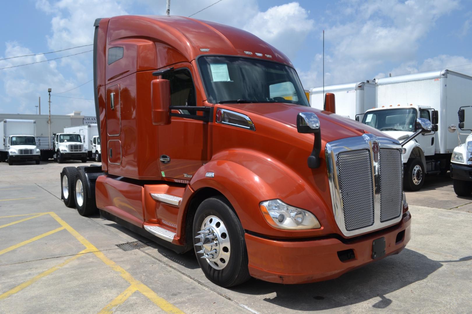 2020 ORANGE /BLACK KENWORTH T680 with an PACCAR MX13 12.9L 455HP engine, PACCAR PO-16F112C 12SPD AUTOMATED transmission, located at 9172 North Fwy, Houston, TX, 77037, (713) 910-6868, 29.887470, -95.411903 - Photo#0